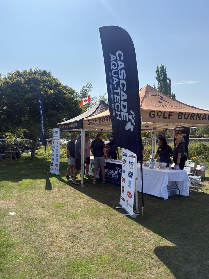The Cascade Aqua-Tech tent and banner at the 2026 BC golf tournament
