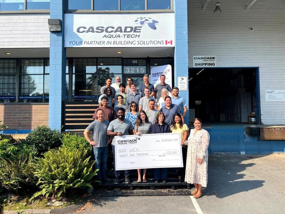 The Cascade Aqua-Tech team presenting a cheque to the West Coast Kids Cancer Foundation outside the Burnaby branch